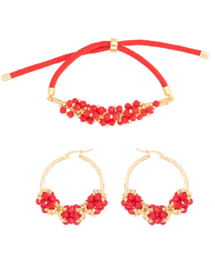 Juego de pulsera y aretes dorados con cristales rojos